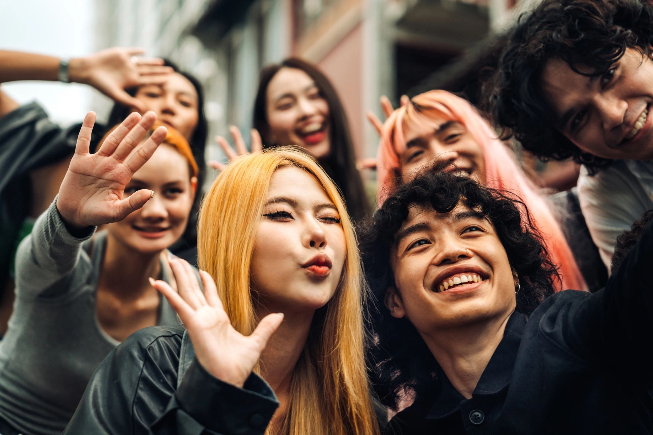Group of friends taking a joyful selfie together